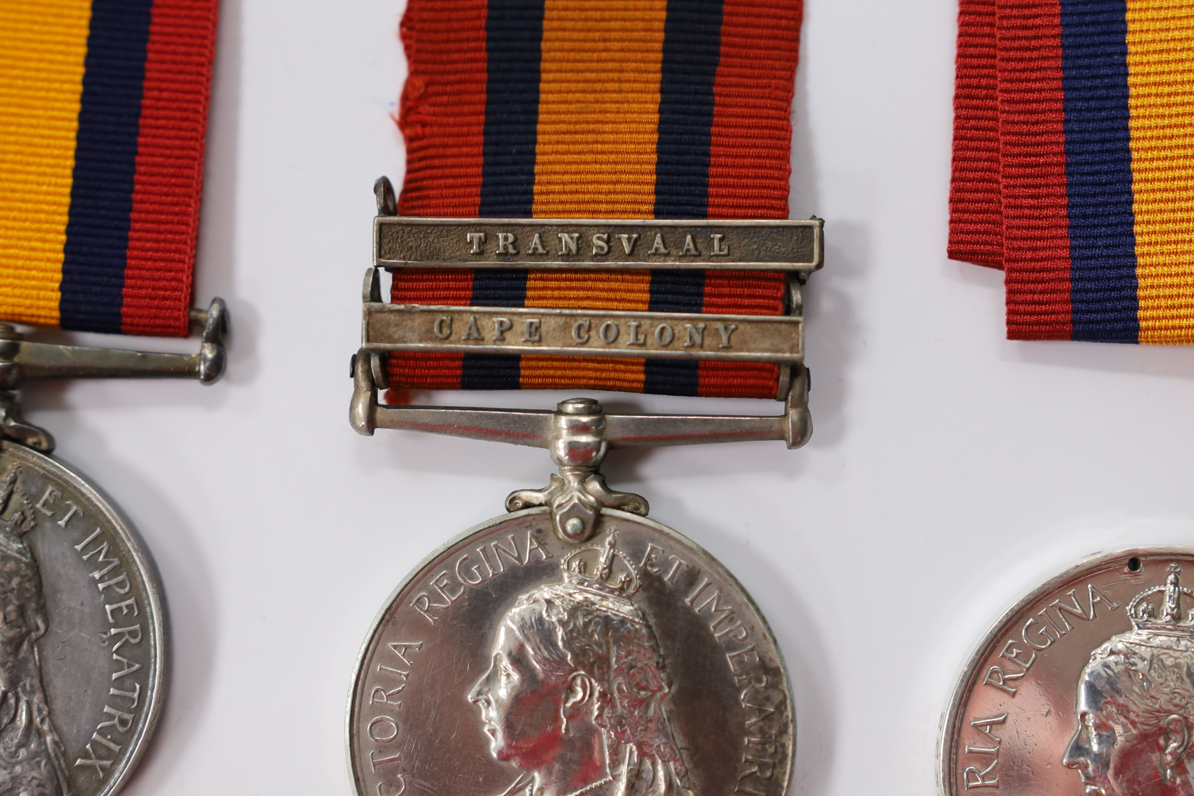 Three Queen's South Africa Medals; Trans & CC to 493 Tpr. T.R.Keegan, W.Prov.M.R.; part erased to 642 Pte E.Boyce Quuenstown Rifle Vol and disc only with Trans and OFS to 2234 Pte J.Martin4th Batt Highland Lt Infy